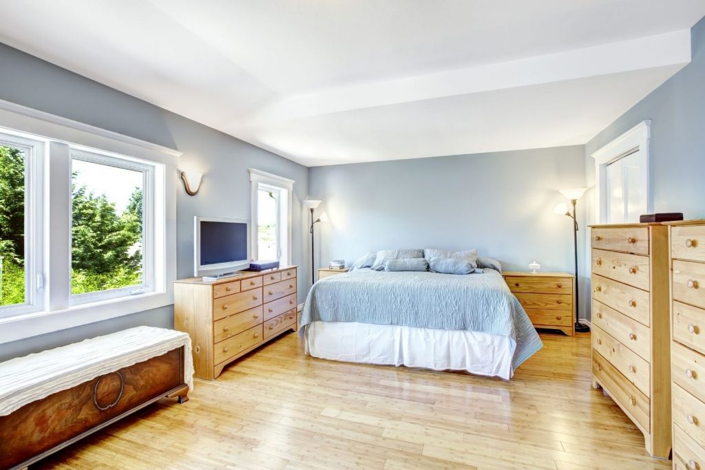light blue bedroom walls with white trim