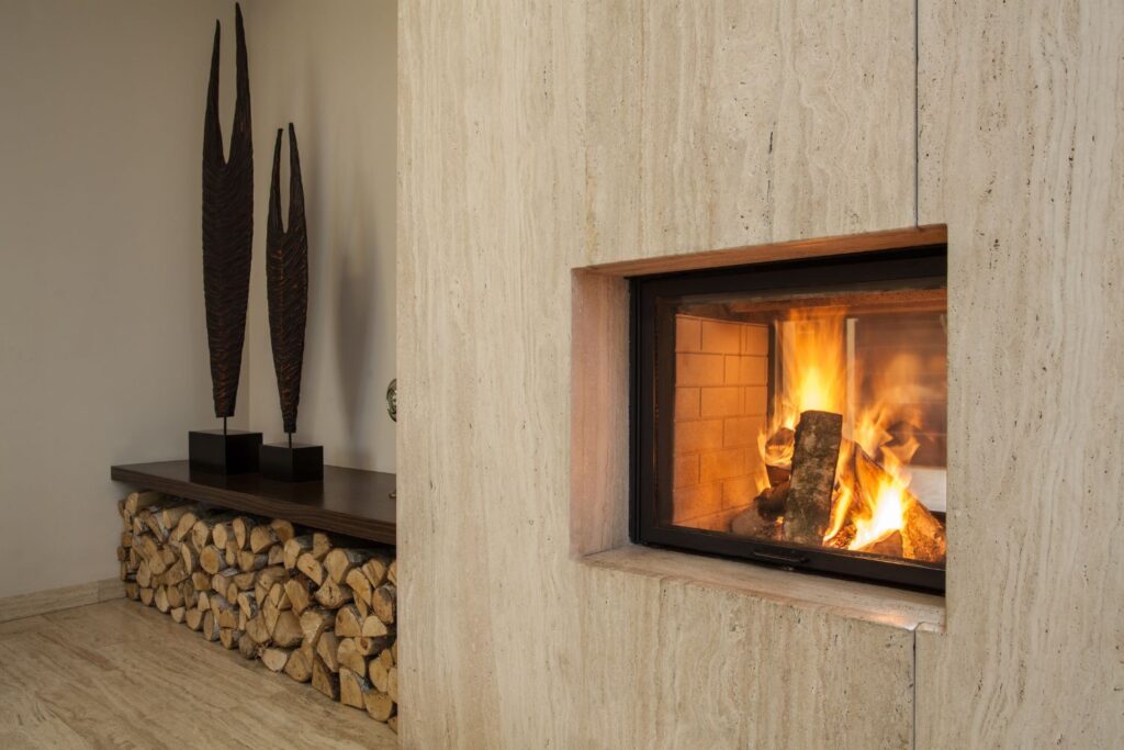 fireplace with a wood panel fireplace accent wall