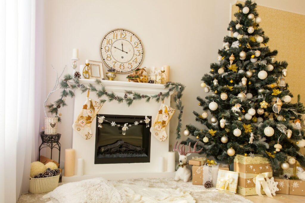 living room with christmas decorations and wall clock above the mantel