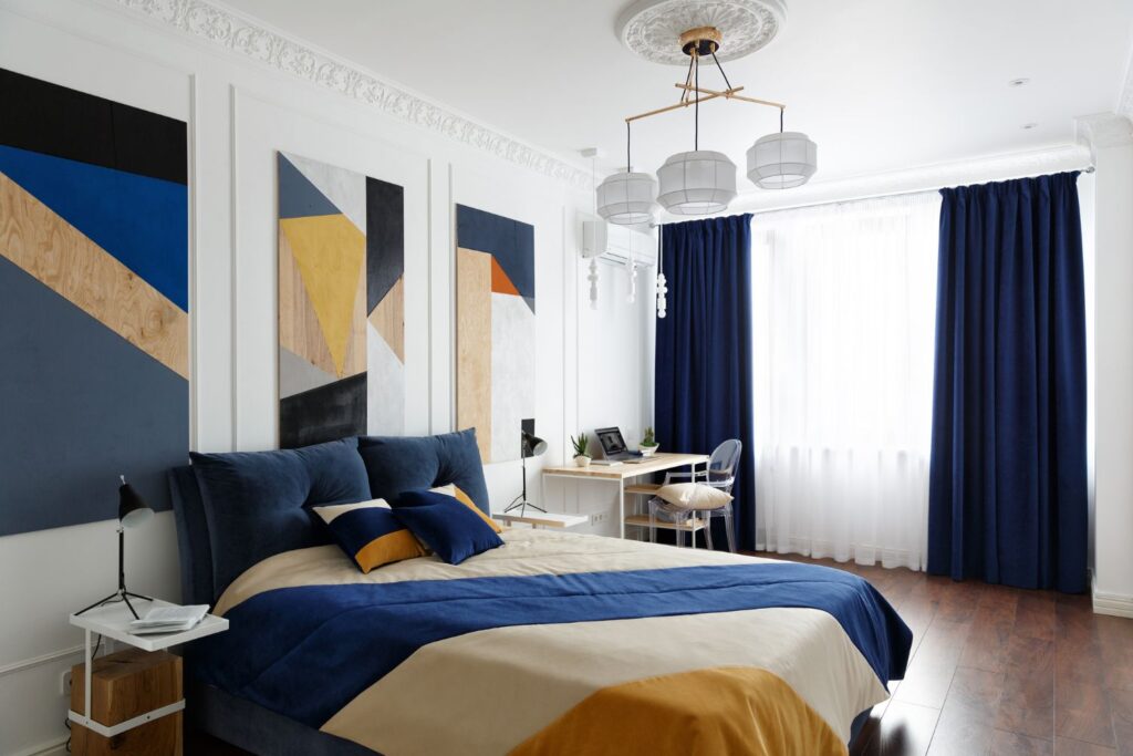 bedroom with navy curtains, one of the best curtain colors for white walls