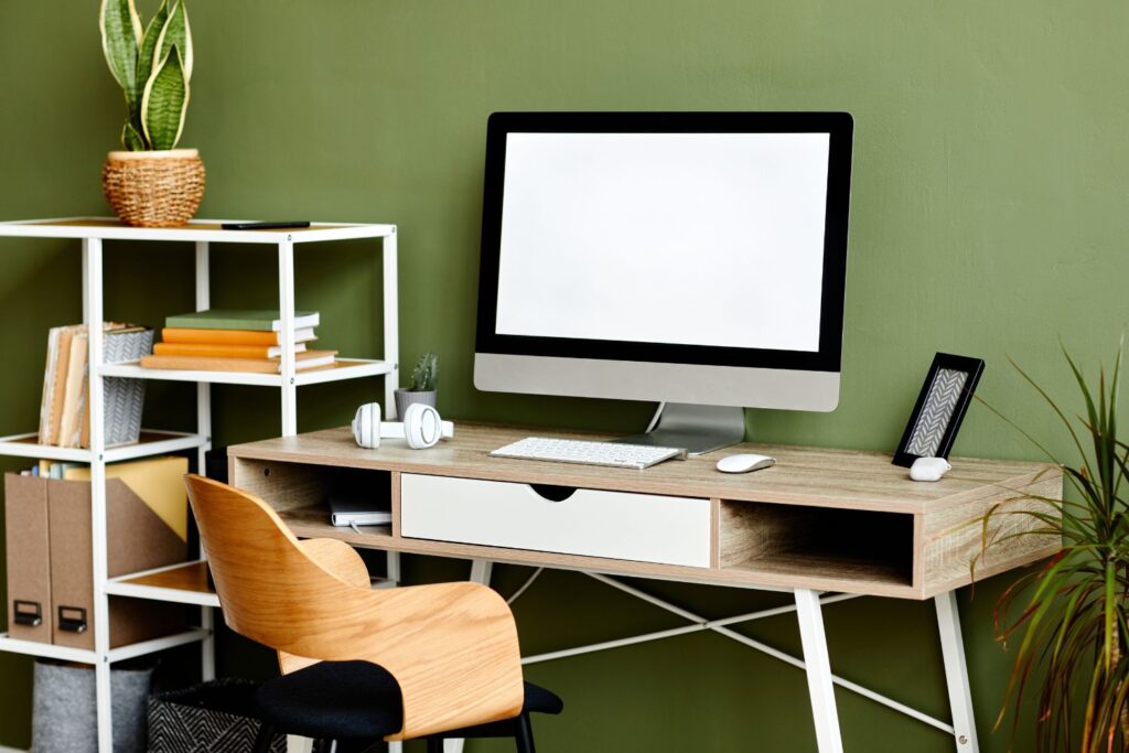 home office with a green home office paint color on the walls