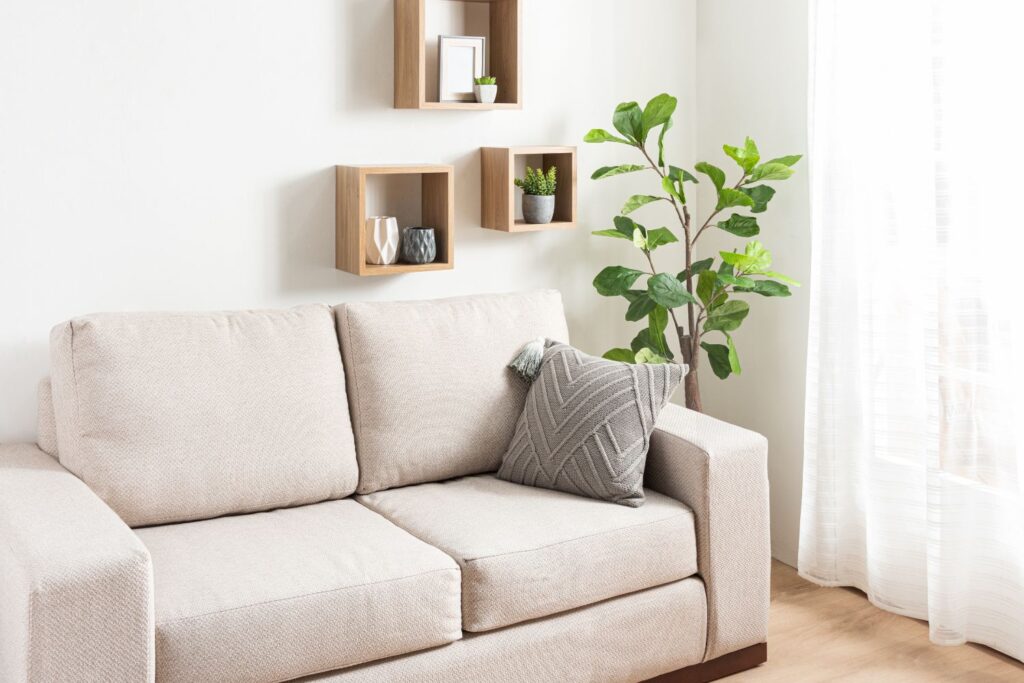 floating shelves above a sofa